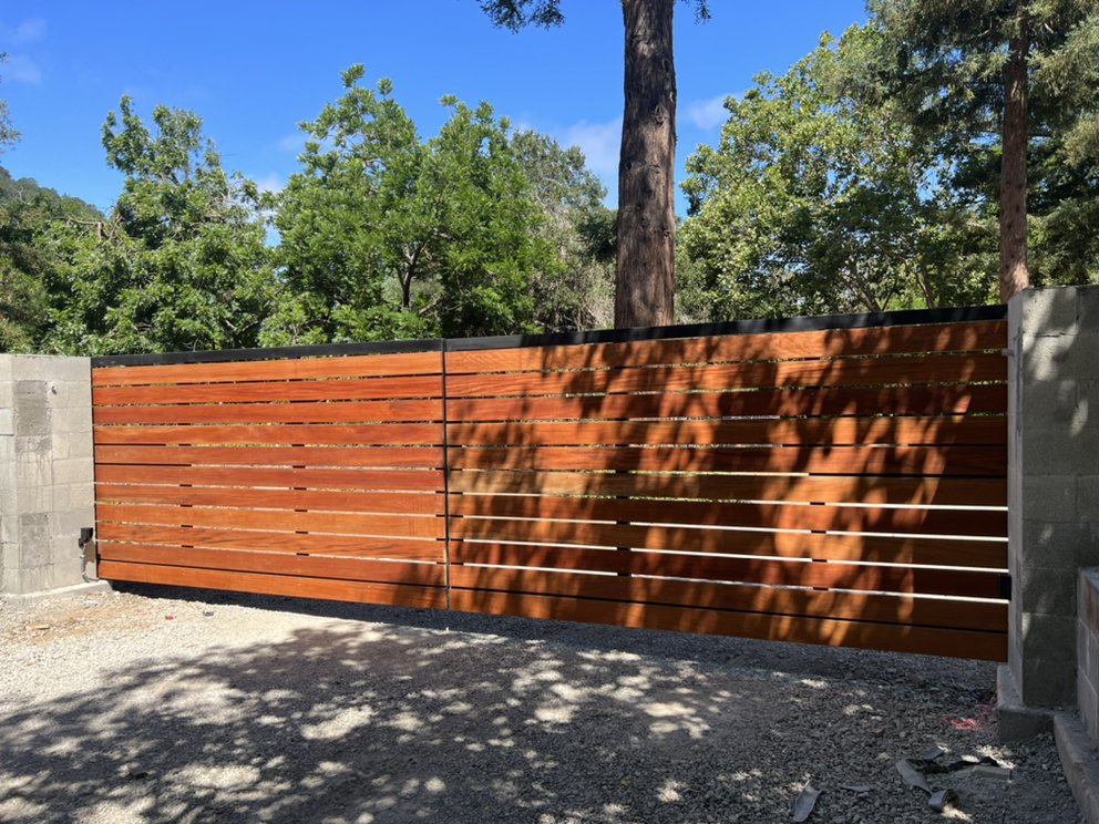 Modern wood slat automatic driveway gate installation